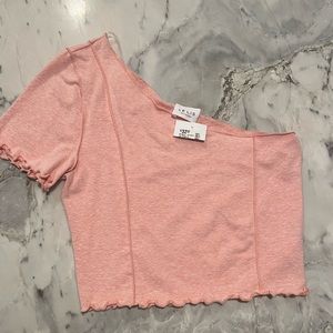 Orange top one sleeved. Size small.